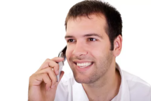 Smiling bank customer talking on the phone